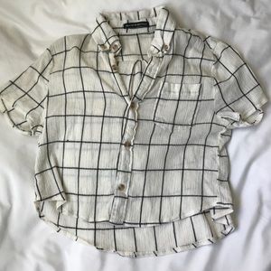 white grid pattern button-up shirt